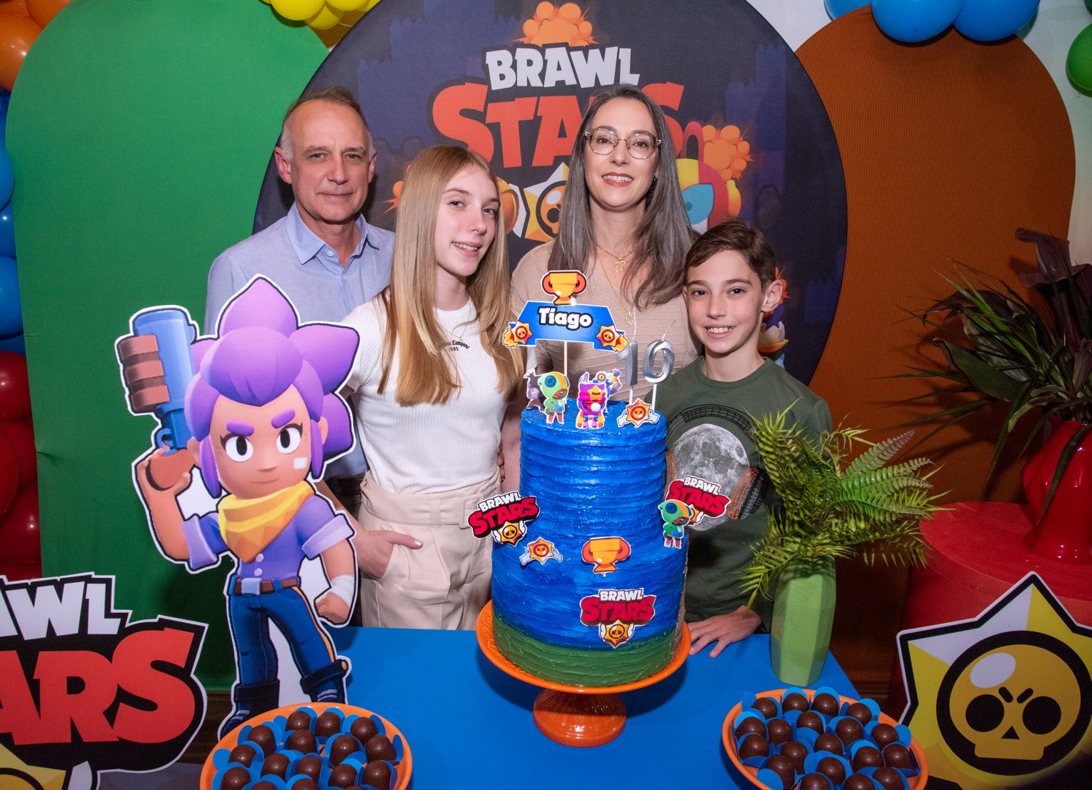Tiago com os pais Jardel e Rosane e com a irmã Alice