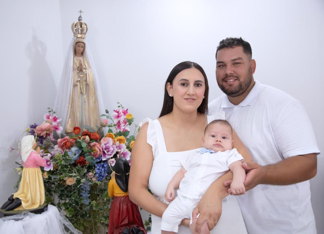 O pequeno Heitor e os pais