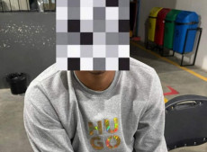 Um dos criminosos presos pela pol&iacute;cia