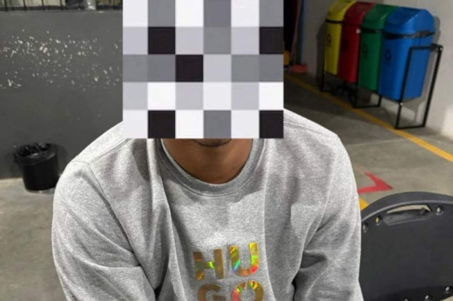 Um dos criminosos presos pela pol&iacute;cia