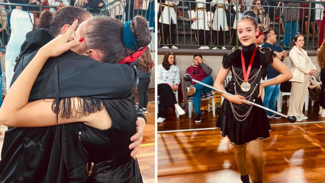 A jovem amanda recebe o carinho da mãe Francieli após a conquista do título de melhor Baliza durante concurso de fanfarras